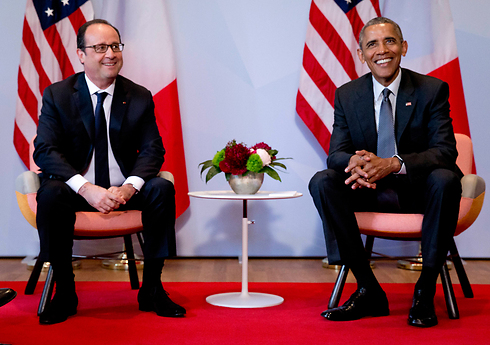 משבר ביחסים. אובמה והולנד בפסגת ה-G7 בגרמניה (צילום: AP) (צילום: AP)