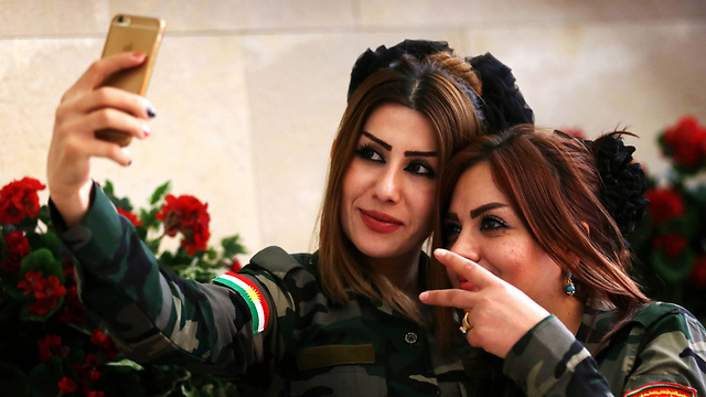 מעוררות השראה. לוחמות "פשמרגה" כורדיות בעיראק (צילום: AFP) (צילום: AFP)