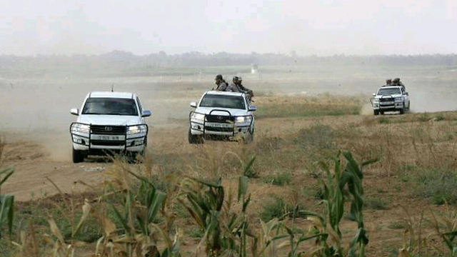 An armed Hamas patrol on the new border road.