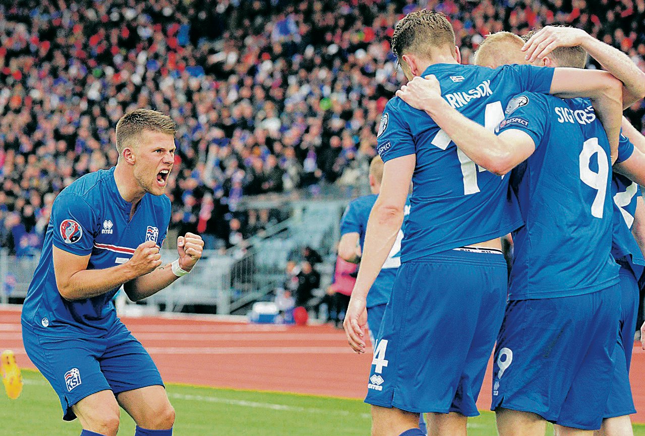 Iceland's Kolbeinn Sigthorsson (number 9) celebrates with team mates and Johann Gudmundsson (L) after scoring against Czech Republic during their Euro 2016 qualifying soccer match in Reykjavik, Iceland, June 12, 2015. REUTERS/Sigtryggur Johannsson (SIGTRYGGUR JOHANNSSON) Iceland's Kolbeinn Sigthorsson (number 9) celebrates with team mates and Johann Gudmundsson (L) after scoring against Czech Republic during their Euro 2016 qualifying soccer match in Reykjavik, Iceland, June 12, 2015. REUTERS/Sigtryggur Johannsson (SIGTRYGGUR JOHANNSSON)