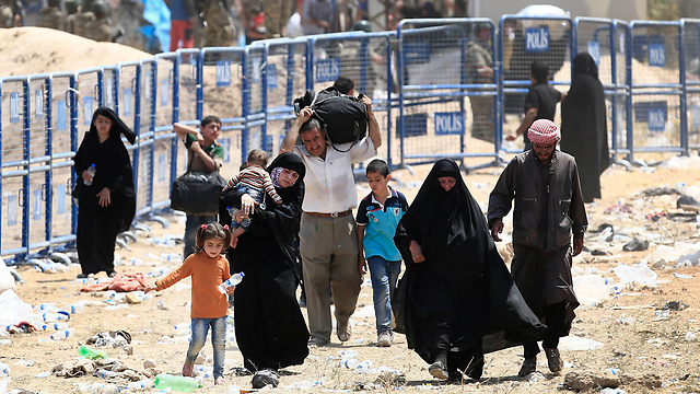 Syrian refugees on the Turkish border. (Photo: AP) (Photo: AP)