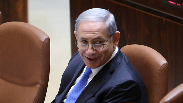 Netanyahu still knows how to smile like his days in American high school. (Photo: Gil Yohanan) (Photo: Gil Yohanan)