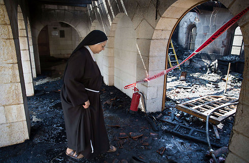 Arson at the Church of the Multiplication of the Loaves and Fish. Almost all prominent halachic adjudicators define Christianity as 'idolatry' (Photo: AFP) 