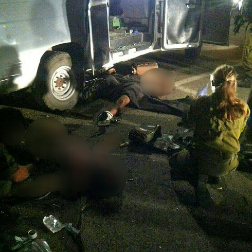 The wounded Syrians taken out of the ambulance after the attack.