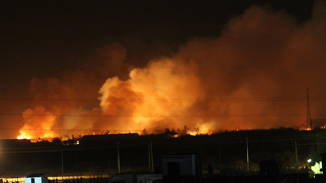 Sudanese munitions factory on fire in 2012, which that country's government blamed on Israel (Photo: EPA)