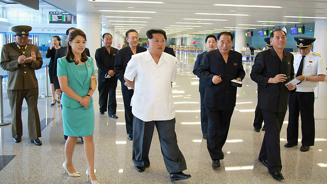 Ким Чен Ын и его супруга. Фото: EPA