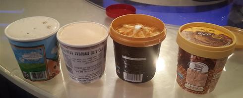 הגודל של גלידות השמנת הישראליות מתעתע: (מימין) ג'ויה של נסטלה - 315 גרם, קרטה דור של גלידת שטראוס 260 גרם, האגן דאז - 415 גרם, בן אנד ג'ריס 430 גרם ()