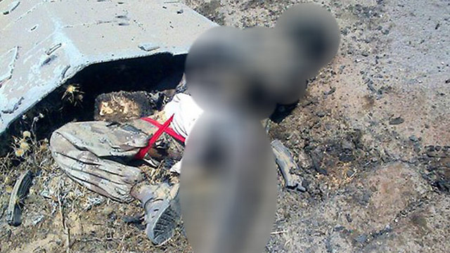 A photo released by the Egyptian Army apparently showing a militant dead in Sinai.