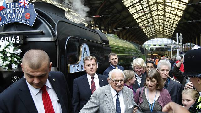Sir Nicholas Winton with some of the 'children' he saved (Photo: AP) 