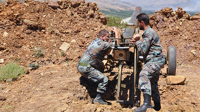The Syrian Army fighing near the Lebanese border (Photo: EPA)