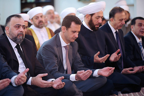 Syrian President Bashar Assad made a public appearance for the holiday (Photo: AFP)