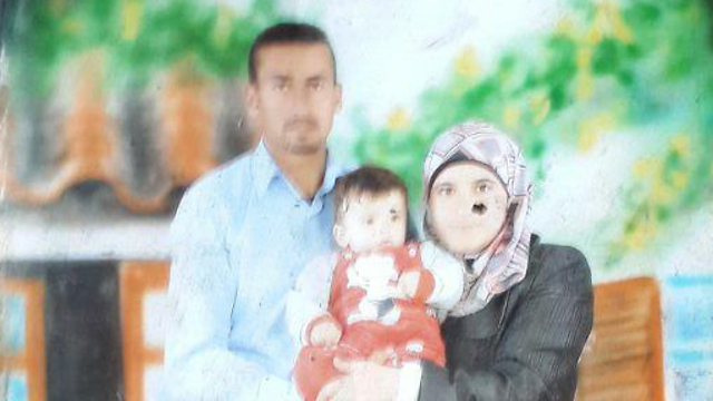 Ali Dawabsheh with his parents (Photo: Hassan Shaalan)