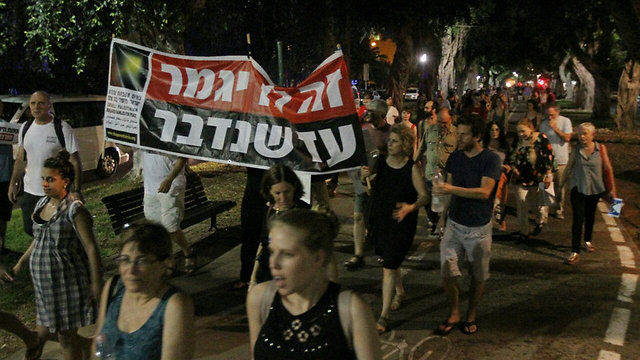 Protestors march from Rabin Square to Meir Park, Saturday evening. We can't settle for promises to catch and punish the culprits (Photo: Ido Erez)