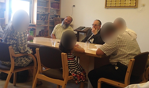 Giyur K'Halacha's rabbis meet with a family (Photo: Giyur K'Halacha)
