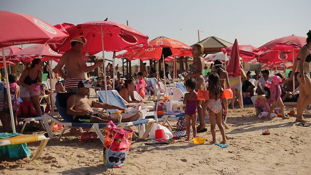 Metzitzim Beach in Tel Aviv was packed on Saturday as people flocked to the water (Photo: Yaron Brener)