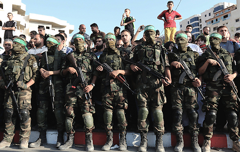 Izz ad-Din al-Qassam Brigades on parade. (Photo: EPA)