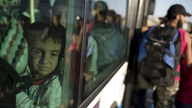 מהגרים באתונה (צילום: רויטרס) (צילום: רויטרס)