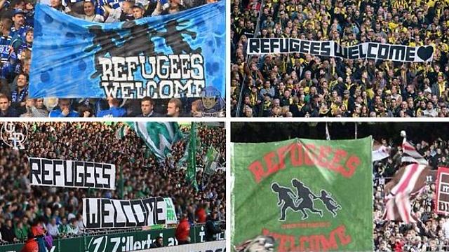 אוהדי כדורגל בגרמניה: "ברוכים הבאים פליטים" ()