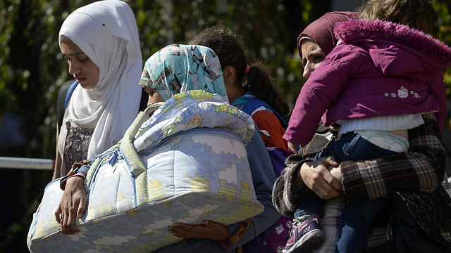 פליטים מהמזרח התיכון במינכן, גרמניה (צילום: AFP) (צילום: AFP)