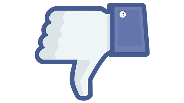 A doctored 'dislike' Facebook icon. Facebook has been the source of most racist and inciting comments in 2015.