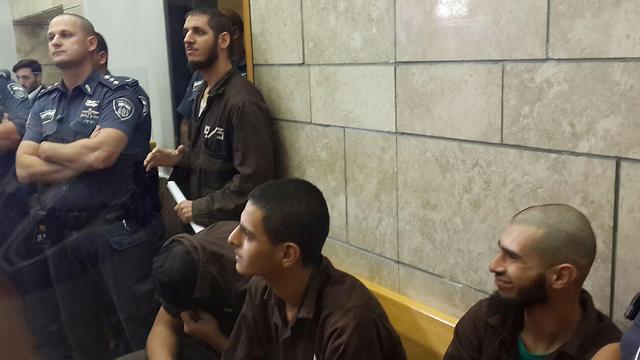 Four of the suspects in court on Thursday. (Photo: Mohammed Shinawi)