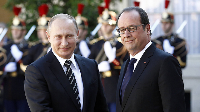 נשיא צרפת הציע לכוחות אסד והאופוזיציה לשלב כוחות? כך טוען פוטין (צילום: gettyimages) (צילום: gettyimages)