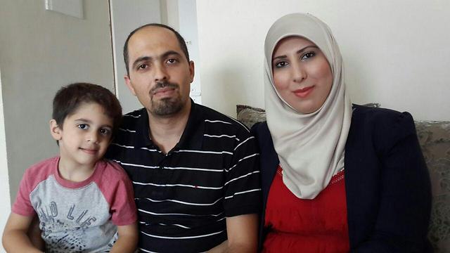 ג'ואברה ומשפחתה. צריך למחות נגד רצח (צילום: מוחמד שינאווי) (צילום: מוחמד שינאווי)