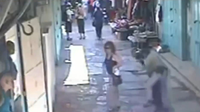 A still from the video featuring a past attack