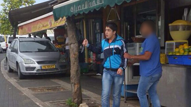 16-year-old assailant with knife in the morning attack (Photo: Tzipi Malkov)
