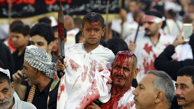 Self mutilation on the day of Ashura. (Photo: AFP)