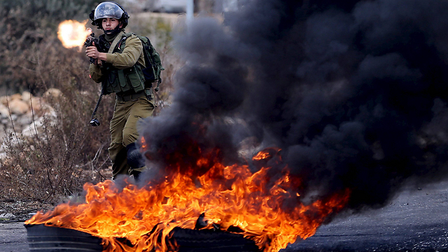 Clashes near Bet El (Photo: Reuters)