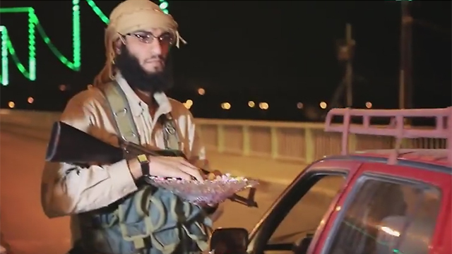 ISIS. handing out candy in Iraq after news of the downed Russian plane