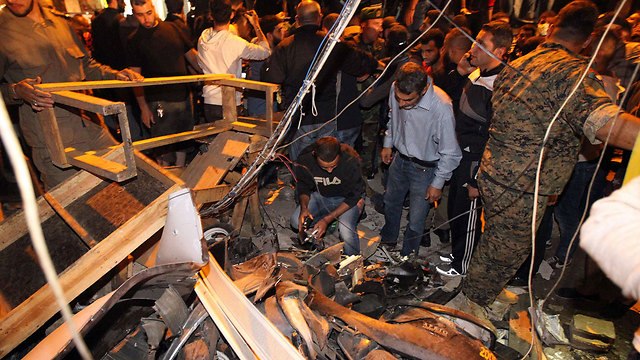 Crowds gathered at the scene of the attack surveying the destruction. (Photo: AFP)