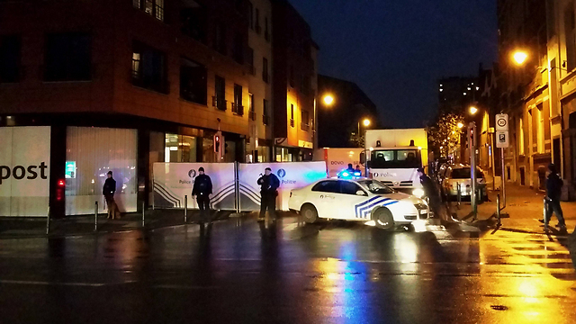 Belgian police in the Molenbeek neighborhood of Brussels Saturday. (Photo: AFP)