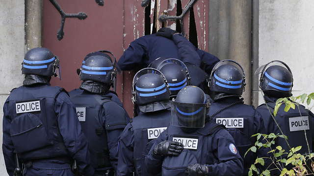 French police during a raid on terror suspects (Photo: AFP)