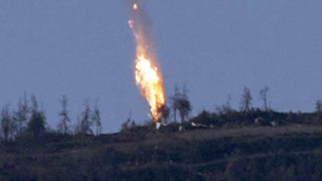 The Russian plane crashing on the Turkey-Syria border. (Photo: EPA)