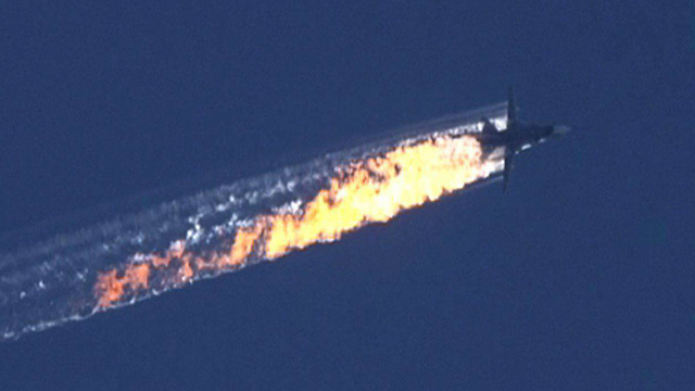 The Russian jet after being shot down by Turkish aircraft (Photo: EPA) (Photo: EPA)