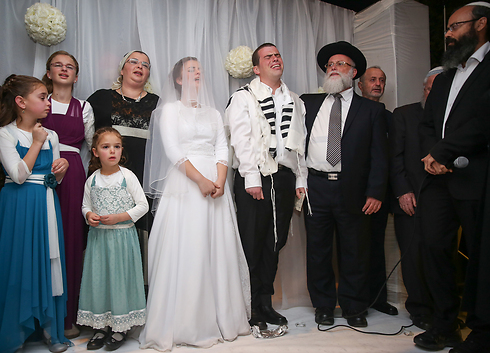Sarah Litman and Ariel Biegel at their wedding in Jerusalem (Photo: Hadas Parush)