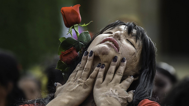 מפגינות ביום נגד אלימות כלפי נשים בבוגוטה, קולומביה (צילום: AFP) (צילום: AFP)