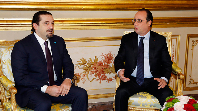 Former Lebanese Prime Minister Saad Hariri with French President Francois Hollande. (Photo: EPA)