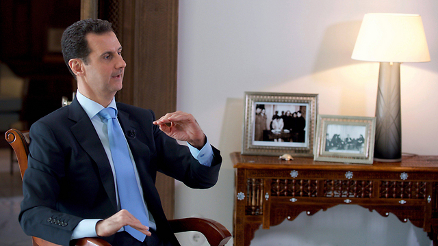 Assad speaking to journalist Hala Jaber of the Sunday Times (Photo: EPA)
