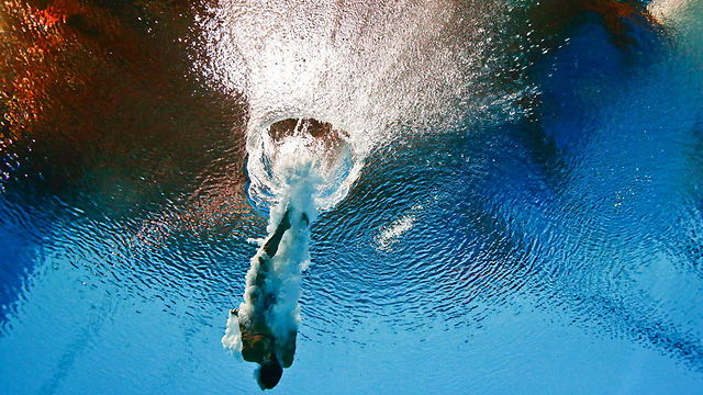 טניה קניוטו מאיטליה באליפות העולם בקפיצה למים ברוסיה (צילום: רויטרס) (צילום: רויטרס)