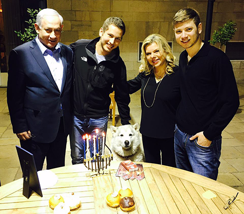 The Netanyahu family with their dog, Kaia