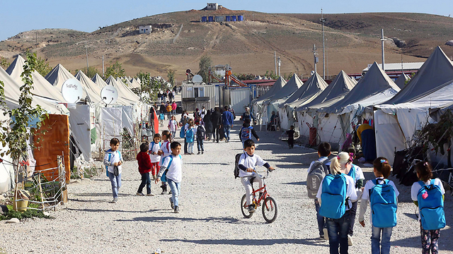מחנה הפליטים עוסמאנייה. 85% מהפליטים חיים מחוץ למחנות (צילום: AFP) (צילום: AFP)