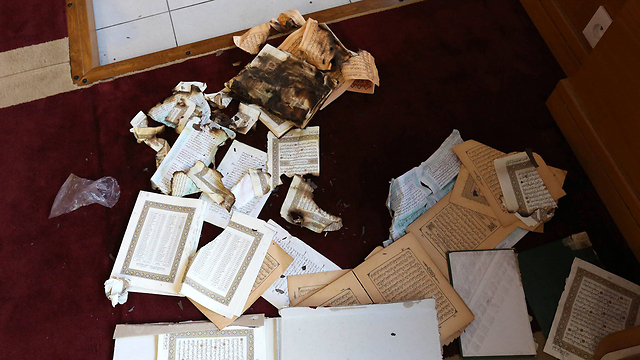 Burnt Koran books in Corsica (Photo: AP)