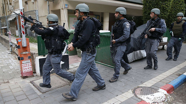 Police searching for the suspected shooter following an attack in central Tel Aviv that killed two and wounded several others (Photo: AFP)