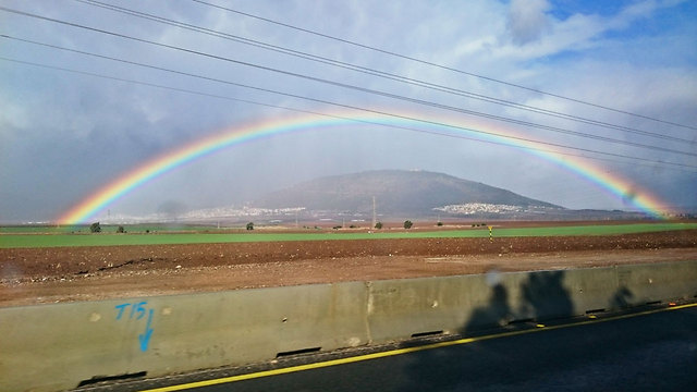 A rainbow over Mount Tabor in the Lower Galilee (Photo: Noy Shitrit)