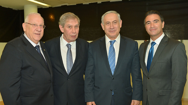 Left to right: President Rivlin, outgoing Mossad chief Pardo, Prime Minister Netanyahu, new Mossad chief Cohen (Photo: Koby Gideon, GPO)