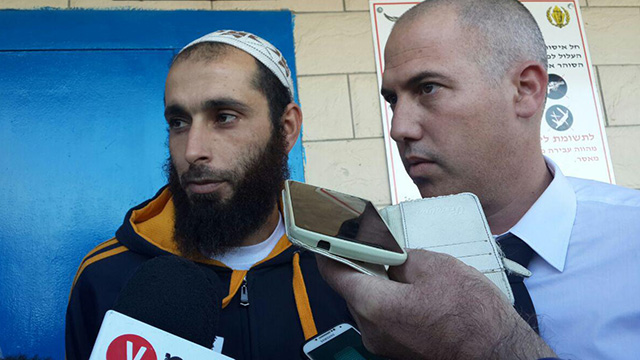 Jodat Melhem (L) after his release on Wednesday