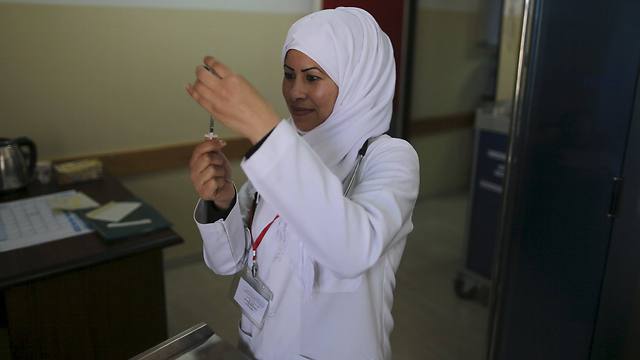 A member of staff at the Indonesia Hospital in Gaza (Photo: Reuters)